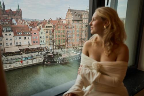 Foto DEO PLAZA Premium Suites & Riverside by Downtown Apartments 5
