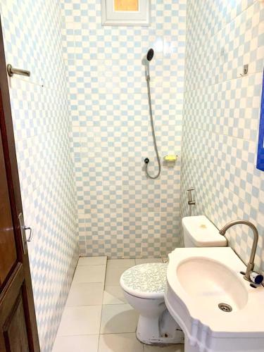 Koupelna v ubytování Toutaf Logement