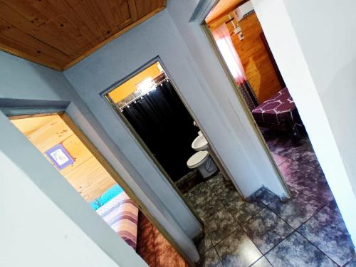 an overhead view of a room with a bathroom and a stairway at jazmin apart iguazu in Puerto Iguazú