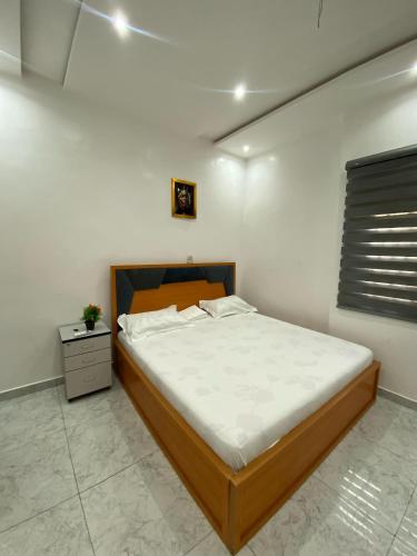 Llit o llits en una habitació de Paradis Caché Guest House