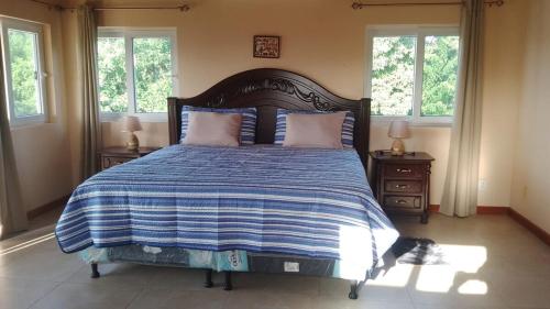 Llit o llits en una habitació de Turquoise View