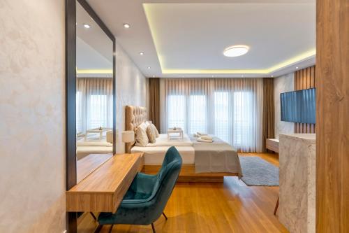 a bedroom with a bed and a large mirror at Vila Pino Silvestre in Zlatibor