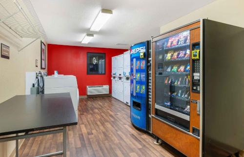 a room with a soda vending machine in a store at Extended Stay America Suites - Cincinnati - Florence - Turfway Rd in Florence