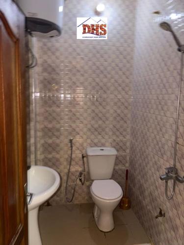 Vannas istaba naktsmītnē DHS Home