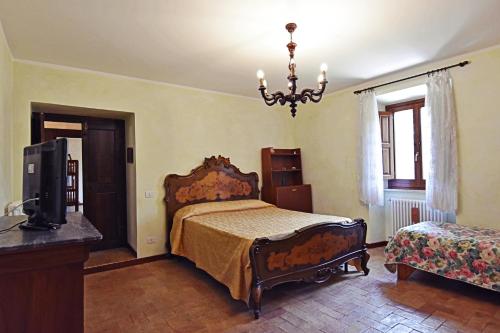 Postel nebo postele na pokoji v ubytování Chalet Colle Lo Zoppo