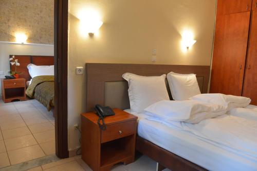 Hotel Galaxyにあるベッド