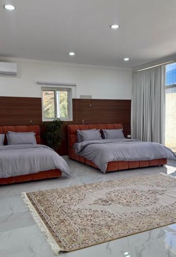 Llit o llits en una habitació de ALSARA HiDEAWAY