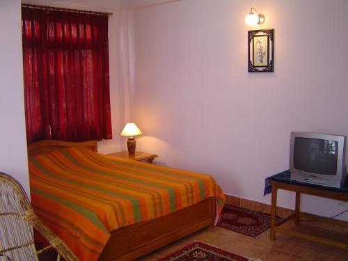 Posteľ alebo postele v izbe v ubytovaní Deki Lodge
