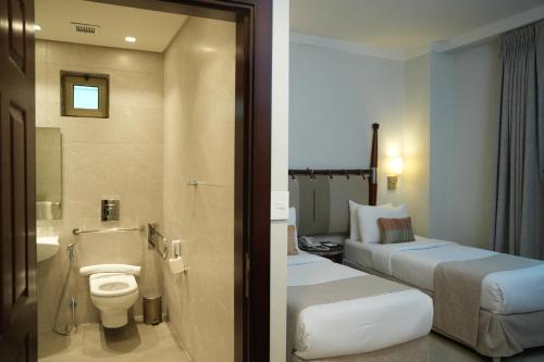 Koupelna v ubytování Retaj Hotel