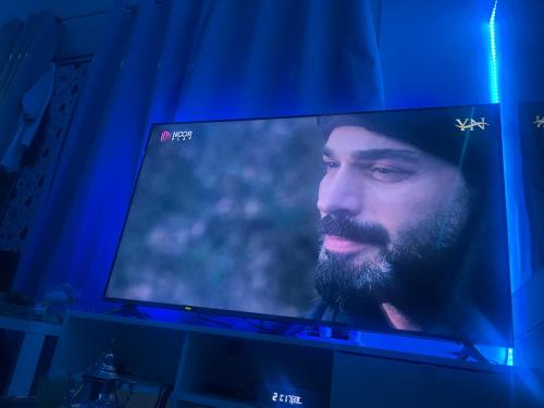 TV a/nebo společenská místnost v ubytování Lotus