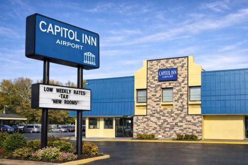 a sign in front of a car rental inn airport at Capitol Inn by Belvilla Richmond Airport VA in Sandston