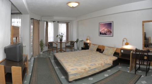 Postel nebo postele na pokoji v ubytování Hotel Balevurov
