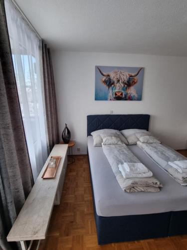 Llit o llits en una habitació de Ferienwohnung E&E