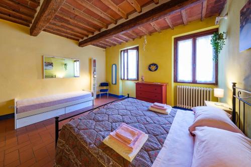 a bedroom with a large bed in a room at il Giglio di San Giovanni in Florence