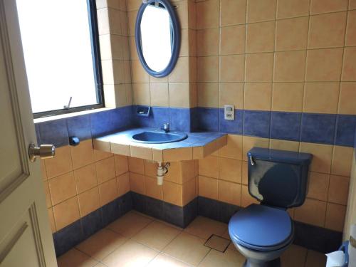Ett badrum på Isabela Hotel Suite