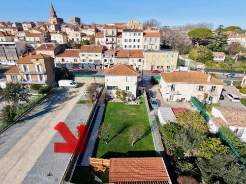 an aerial view of a city with houses at Cosy Studio Fréjus Centre Historique in Fréjus