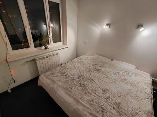 Llit o llits en una habitació de Up!House Kiev str