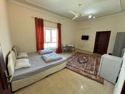 Ліжко або ліжка в номері Eram