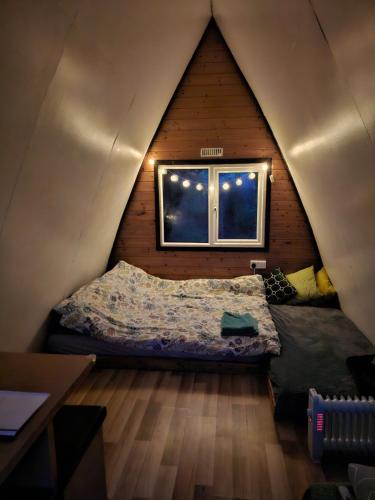 a bedroom with a bed in a small room at Carlingford Mountain Farm in Dundalk