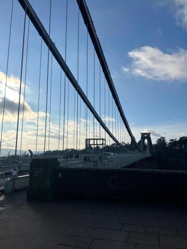 a view of a suspension bridge with the sky at Spacious apartment in Leigh woods in Bristol