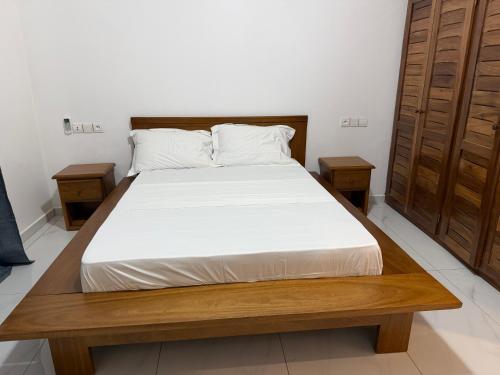 Llit o llits en una habitació de Résidence L H