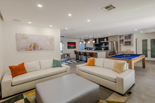 a living room with two couches and a pool table at Luxury Scottsdale Retreat with Heated Pool, Hot Tub, Fire Pit & Game Room & Sleeps 12 in Scottsdale