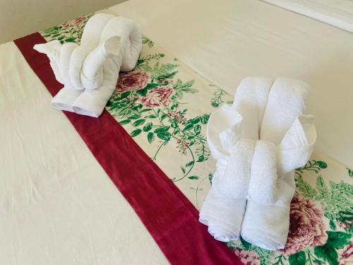 two towels on a rug on a floor at Paradise view A7-Kantiang paradise resort- in Ko Bu Bu