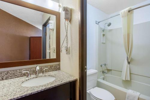 a bathroom with a sink and a toilet at Scenic View Inn - Lake Powell - Page AZ in Page