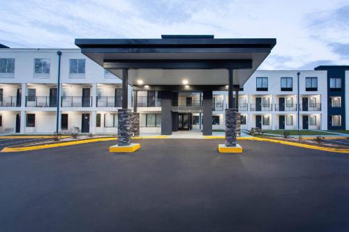 an empty parking lot in front of a building at Clarion Pointe in Charlotte