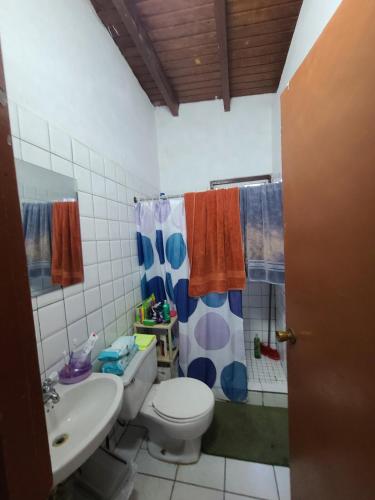 a bathroom with a toilet and a sink at Palm Beach 278 in Palm-Eagle Beach
