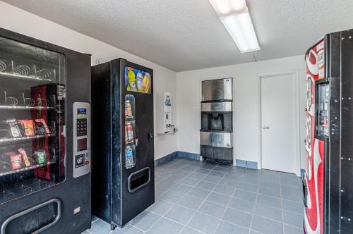 a room with two refrigerators in a room at Motel 6-Dumfries, VA in Dumfries
