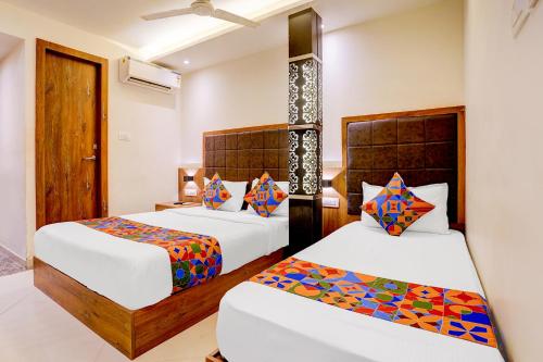 FabHotel Abrol Suites 객실 침대