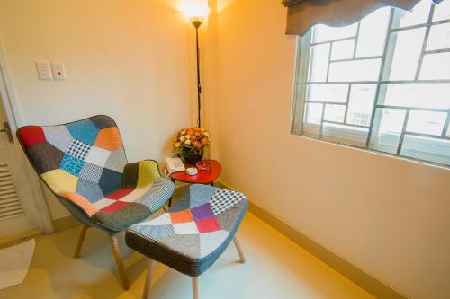 Un lugar para sentarse en Smile Hotel