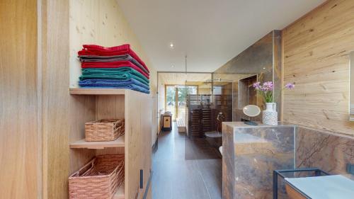 a hallway of a house with wooden walls at Villa SEE la vie in Rheinsberg