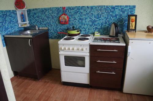 Una cocina o zona de cocina en Always at home - Apartments at Klimasenko 11 block 9