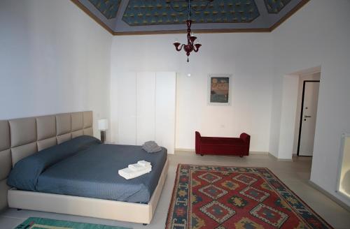 Un pat sau paturi într-o cameră la Apulia Nirvana House