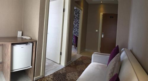 Zona de estar de Udi Hotel