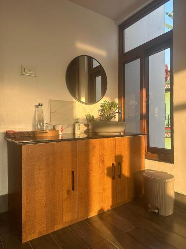 a bathroom with a sink and a mirror at Bagaan Villa Homestay in Ilām