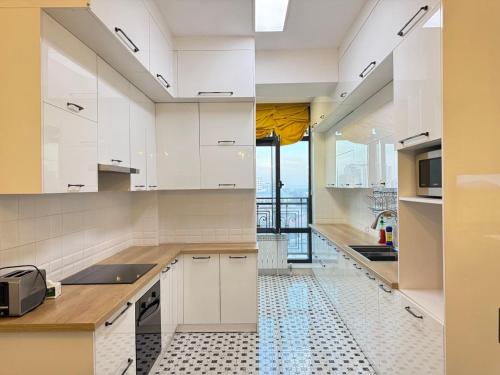 ครัวหรือมุมครัวของ Harmony apartment