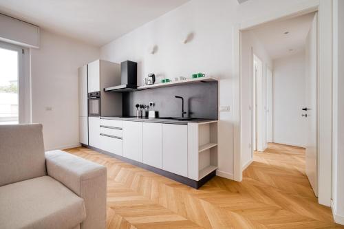 JOIVY Two Stylish Apartments with Balconies in Loreto, Milan
