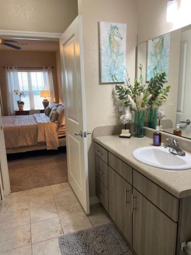 a bathroom with a sink and a mirror at Coastal Comfort in Jacksonville