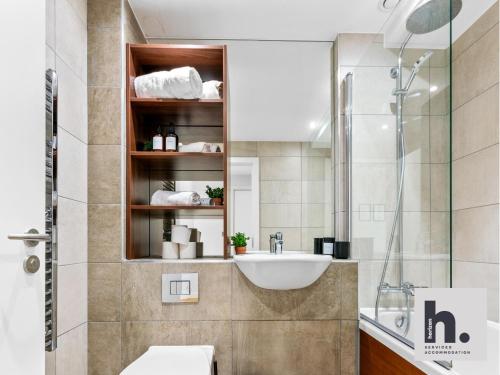a bathroom with a sink and a shower at Contractor Stays - 3 Units - City Centre - Siemens - NHS - Uni - Free Parking in Hull