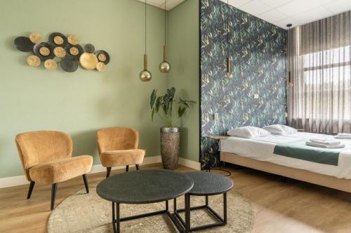 Llit o llits en una habitació de Hotel Ameland