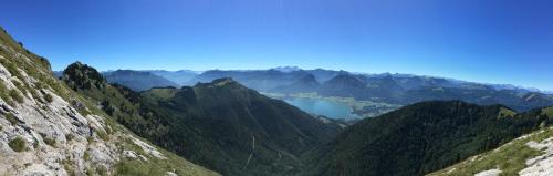 a view of a mountain range with a lake at Hupfmühle Pension in St. Wolfgang
