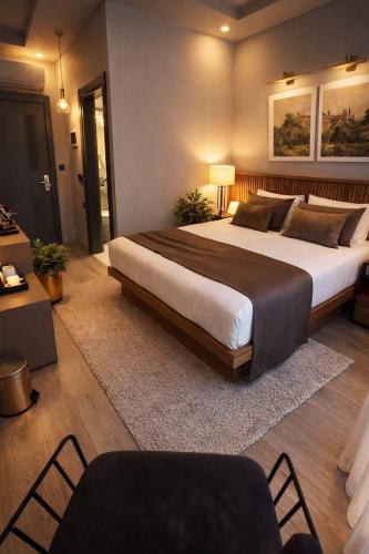 a bedroom with a large bed in a room at Airport Corner Hotel in Trabzon
