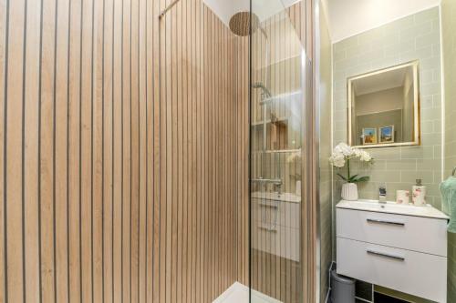 a bathroom with a shower and a sink at 2 Bed in Rosyth oc-r30512 in Rosyth