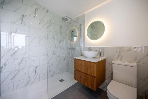 a bathroom with a sink and a toilet at 4 Bed in Crosby oc-b31135 in Northallerton