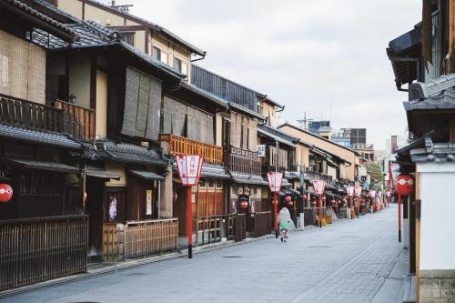 a street in an asian city with street signs at Imperial Hotel, Kyoto in Kyoto
