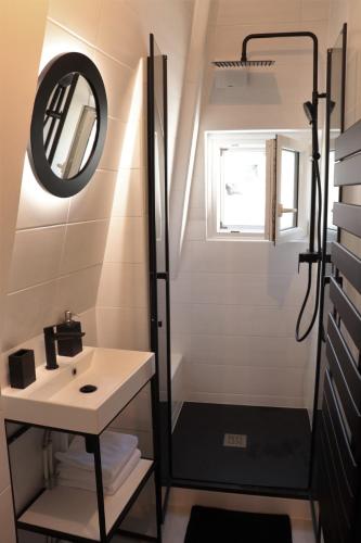 Et badeværelse på La suite dorée