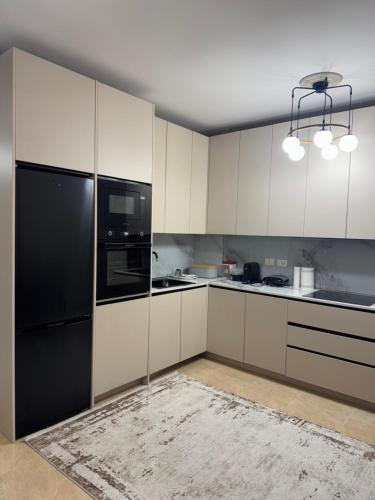 Kuchyň nebo kuchyňský kout v ubytování T apartment